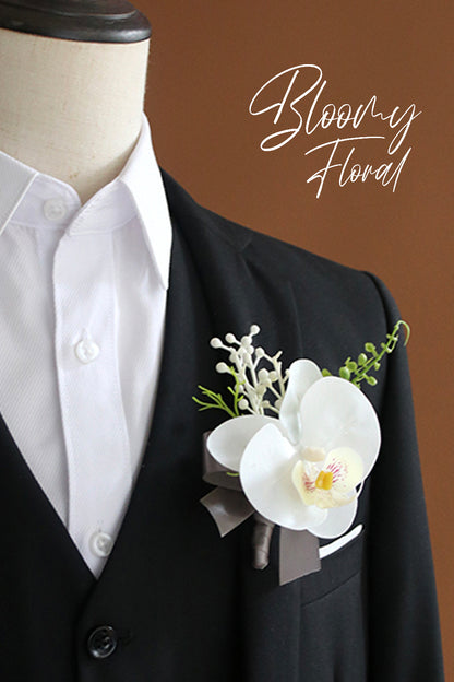 Orchid Boutonnieres in White